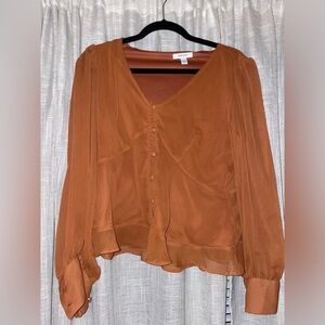 Nine West blouse- rusty orange. Let me know if you would like more photos!